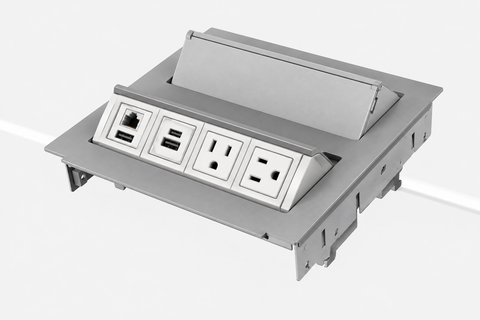 Silver power grommet with outlets, USB, HDMI and a network jack, lid open