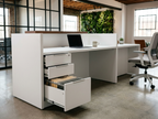 Overture ADA compliant reception desk in white with walnut ledge, box-file drawers open