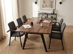 96 inch conference table with black metal legs in a creative agency studio