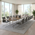 16 person conference table on chrome bases in a bright curtained boardroom