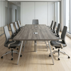 12 person minimal conference table with A-frame legs in a glass-walled boardroom