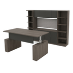 Modern corner office desk in gray woodgrain facing a storage wall with two bookcase towers