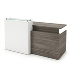 Reception desk with glass counter, white greeter station against gray driftwood storage pedestal