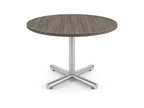 Round office table in gray driftwood on a brushed steel four spoke base
