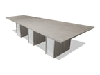 Tenure 10 ft tapered conference table in Iron Hemlock II, a light grey woodgrain laminate, three-quarter view on white