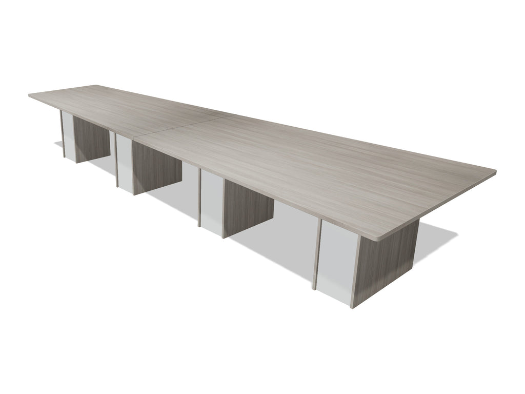 Tenure 15 ft tapered conference table in Iron Hemlock II, a light grey woodgrain laminate, three-quarter view on white