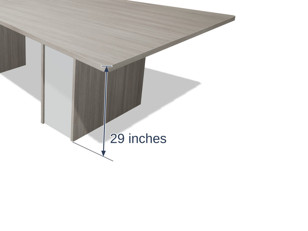 Close-up of a sightline pedestal and the edge band on the Tenure 8 ft tapered conference table in Iron Hemlock II light grey woodgrain, marked 29 inches high