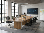 120 inch conference table with panel base in a brick loft boardroom