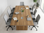 Overhead view of a 10 person conference table on panel bases with gray chairs