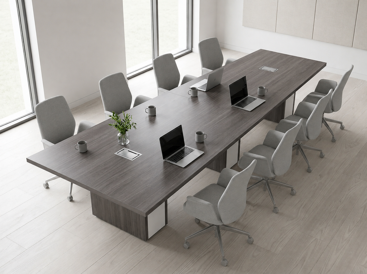 12 ft tapered conference table seating 10 to 12 in a bright white meeting room