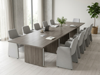 192 by 54 inch conference table with panel base and light upholstered chairs