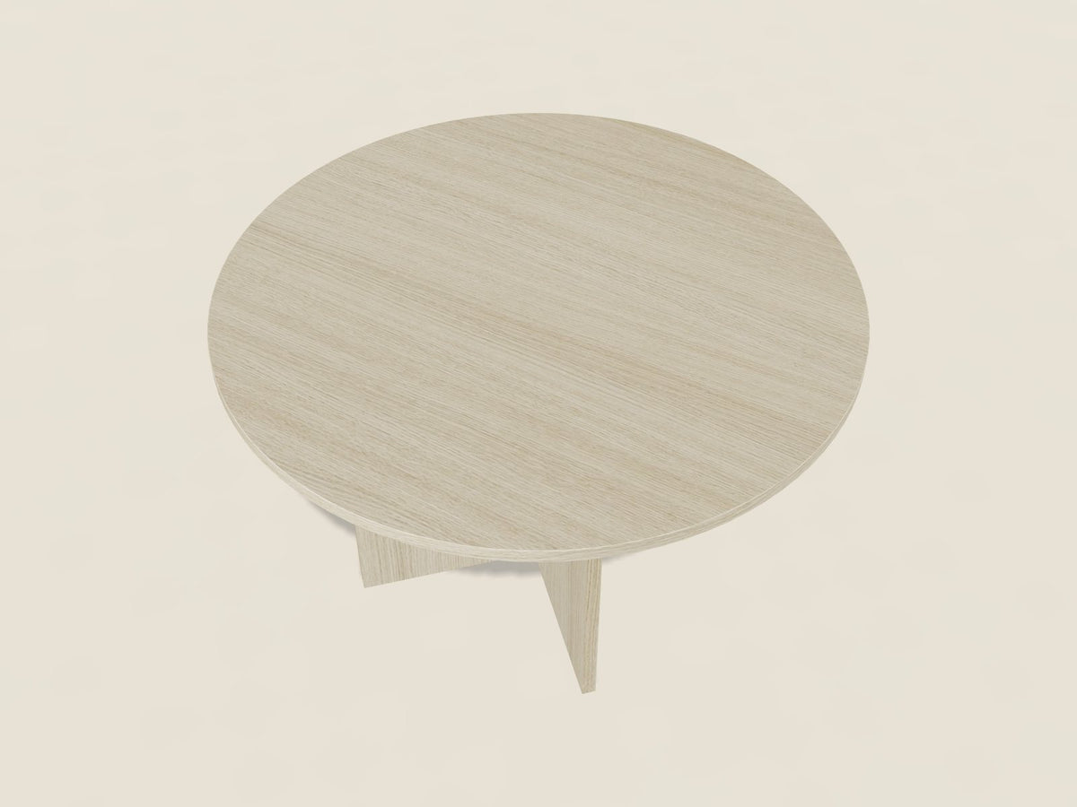 48 inch round meeting table in Battle Creek Oak, a light oak woodgrain laminate, on a laminate X-base