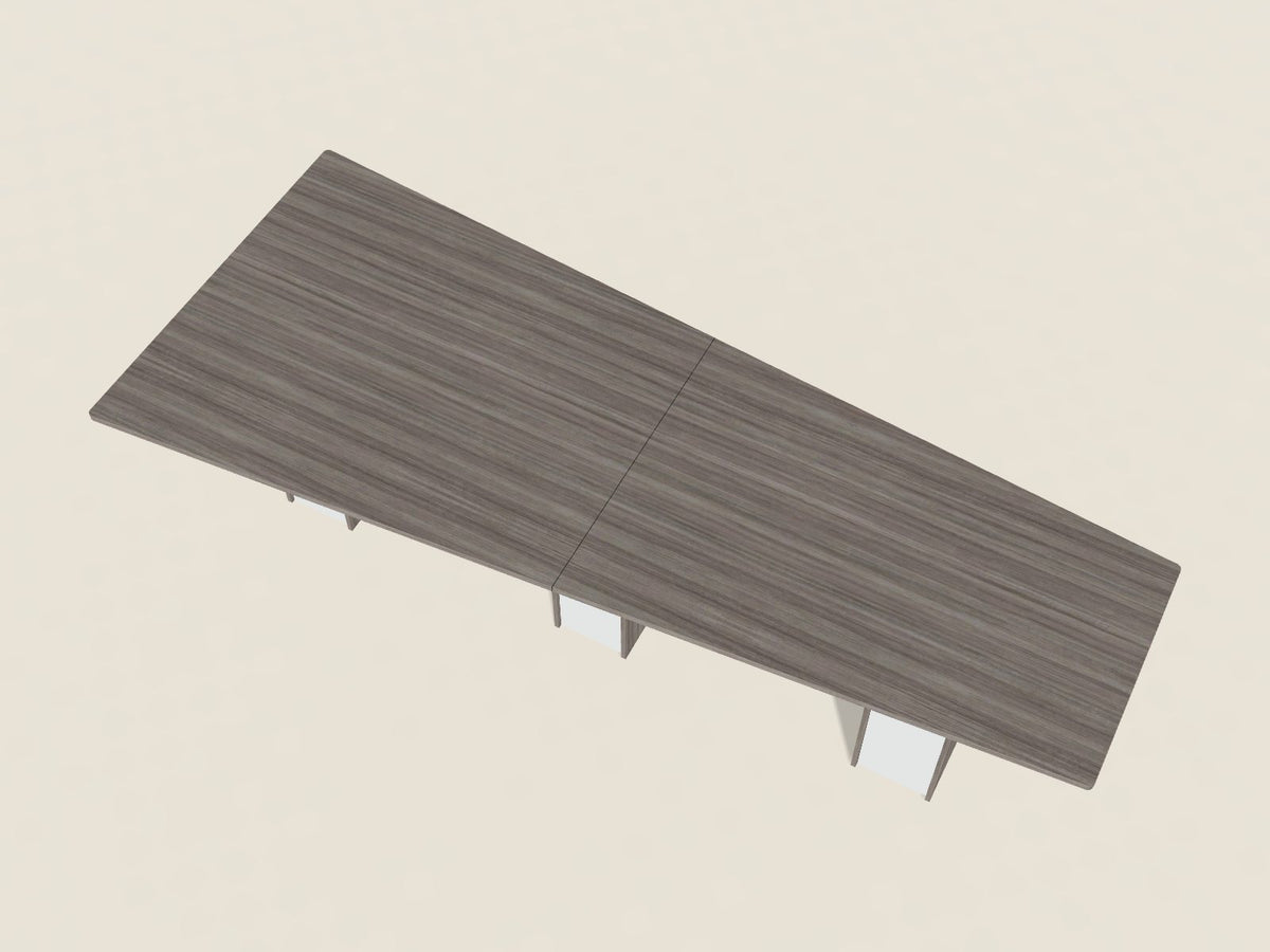 Sightline conference table in Portico Teak, a grey-brown woodgrain laminate, seen from above, wide at one end and narrower at the other